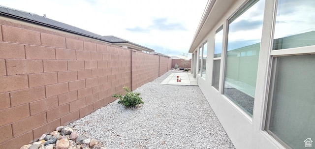 3040 E Lavatera Dr S, St George, UT 84790 - fenced backyard with a patio