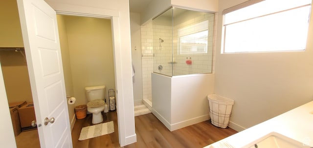 3040 E Lavatera Dr S, St George, UT 84790 - bathroom with wood finished floors, walk in shower, and double vanity