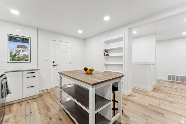 1043 S 1300 W, Salt Lake City, UT 84104 - kitchen with wood counters, light wood-type flooring, white cabinets, recessed lighting, and open shelves