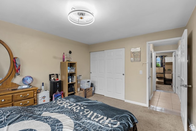 1191 W 4300 S Unit 15A, Taylorsville, UT 84123 - tiled bedroom featuring carpet flooring and a closet