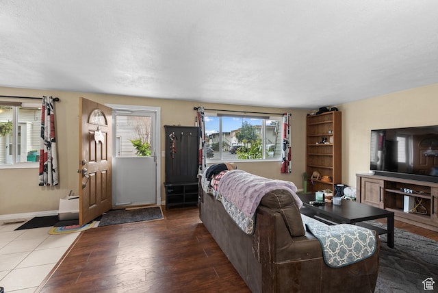 1191 W 4300 S Unit 15A, Taylorsville, UT 84123 - living room featuring wood finished floors and baseboards