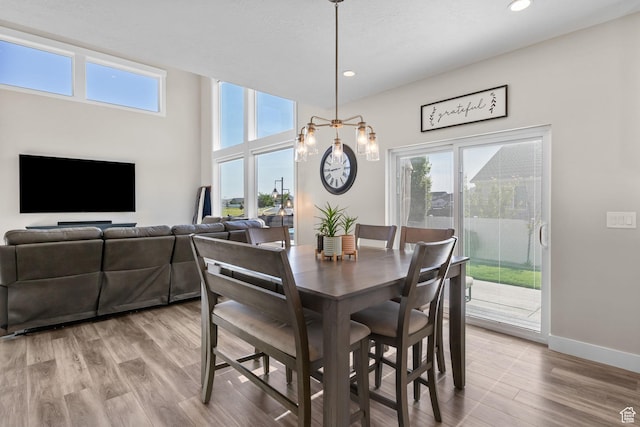 4982 N Goosefoot Dr Unit 51, Eagle Mountain, UT 84005 - dining room with a chandelier, recessed lighting, and light wood-style flooring