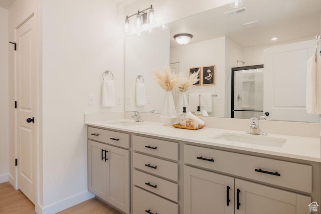 3620 N Stallion St Unit 349, Eagle Mountain, UT 84005 - full bath featuring double vanity and wood finished floors