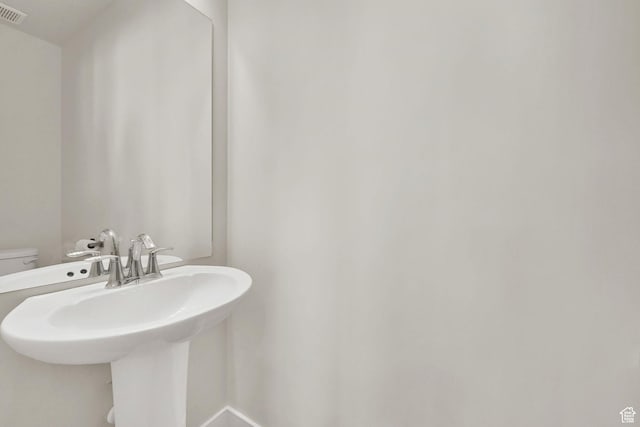 2782 W 4140 S Unit 246, Roy, UT 84067 - half bathroom with a sink and toilet