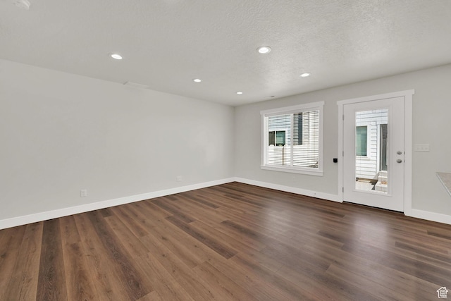2782 W 4140 S Unit 246, Roy, UT 84067 - unfurnished room with dark wood-style flooring, recessed lighting, and a textured ceiling