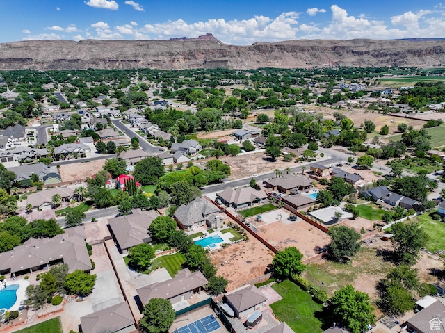 358 S 1040 W, Hurricane, UT 84737 - aerial view of residential area featuring a pool and a mountainous background