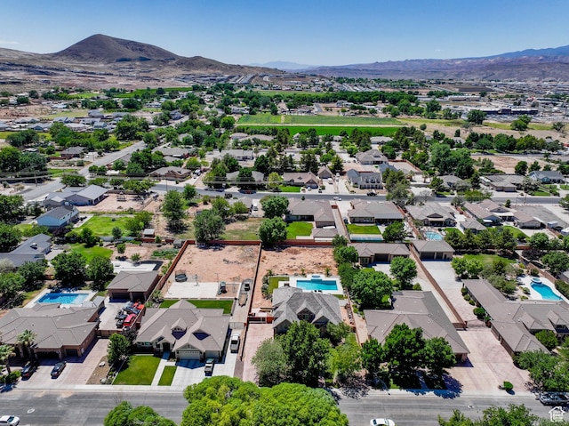 358 S 1040 W, Hurricane, UT 84737 - aerial perspective of suburban area with a pool area and a mountainous background