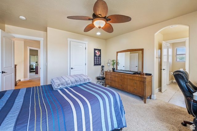 358 S 1040 W, Hurricane, UT 84737 - bedroom featuring arched walkways, light carpet, and a ceiling fan