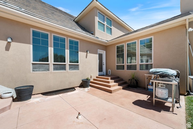 358 S 1040 W, Hurricane, UT 84737 - back of house featuring stucco siding and a patio
