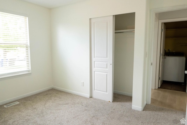 4636 E Ponderosa Way, Eagle Mountain, UT 84005 - unfurnished bedroom with carpet, washer / clothes dryer, and a closet