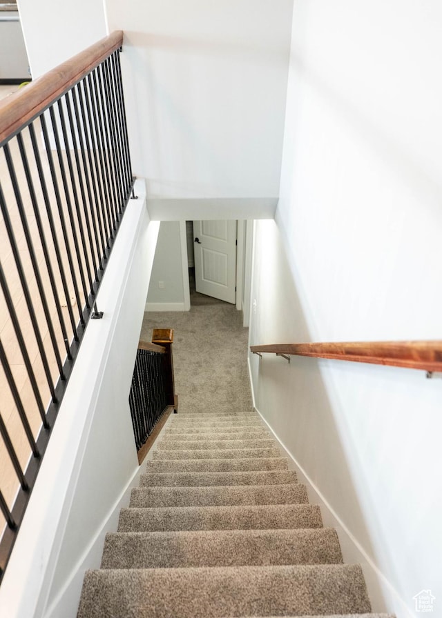 4636 E Ponderosa Way, Eagle Mountain, UT 84005 - staircase featuring carpet flooring and baseboards