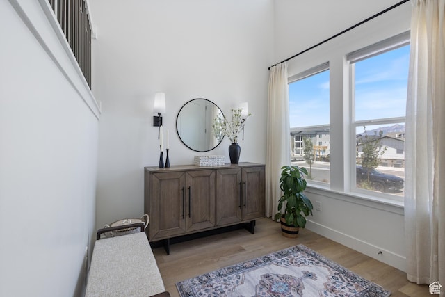 13568 S Vernet Dr W Unit 1824, Riverton, UT 84096 - foyer entrance featuring light wood-style floors and baseboards