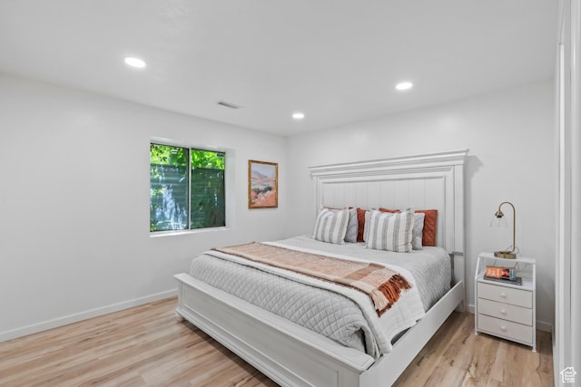 8378 S Sycamore Tree Cv E, Sandy, UT 84094 - bedroom featuring light wood finished floors and recessed lighting