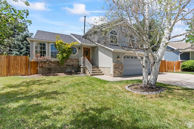 8378 S Sycamore Tree Cv E, Sandy, UT 84094 - view of front facade featuring driveway, brick siding, a garage, and roof with shingles