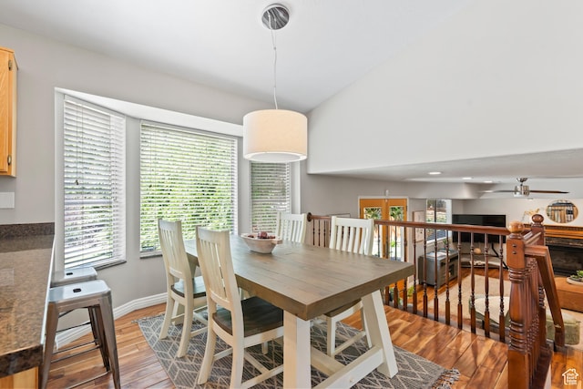 8378 S Sycamore Tree Cv E, Sandy, UT 84094 - dining room featuring healthy amount of natural light, light wood-type flooring, and ceiling fan