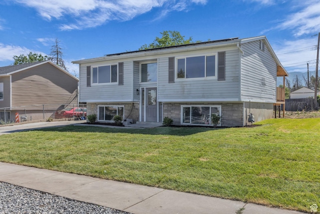 616 N Broadway St, Tooele, UT 84074 - bi-level home featuring stone siding