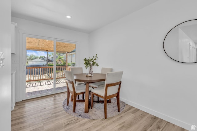 616 N Broadway St, Tooele, UT 84074 - dining room with light wood-style flooring and recessed lighting