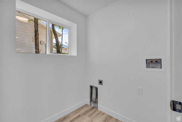 616 N Broadway St, Tooele, UT 84074 - laundry room with hookup for an electric dryer, washer hookup, and light wood finished floors