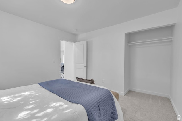 616 N Broadway St, Tooele, UT 84074 - bedroom featuring light colored carpet and baseboards