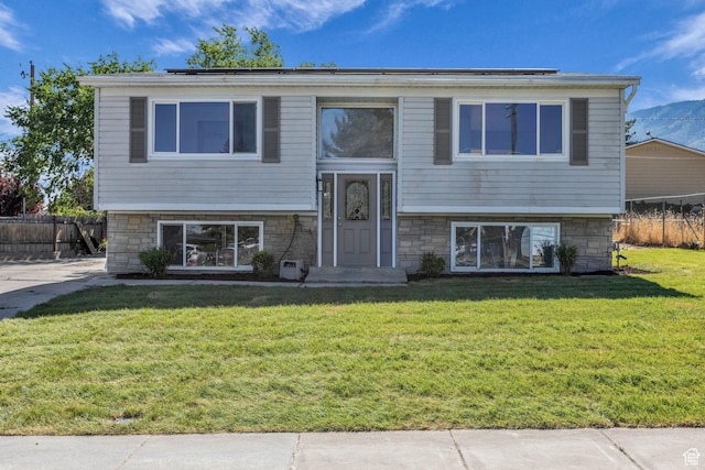 616 N Broadway St, Tooele, UT 84074 - split foyer home featuring stone siding
