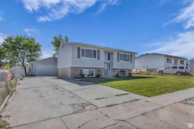 616 N Broadway St, Tooele, UT 84074 - split foyer home with a detached garage and stone siding