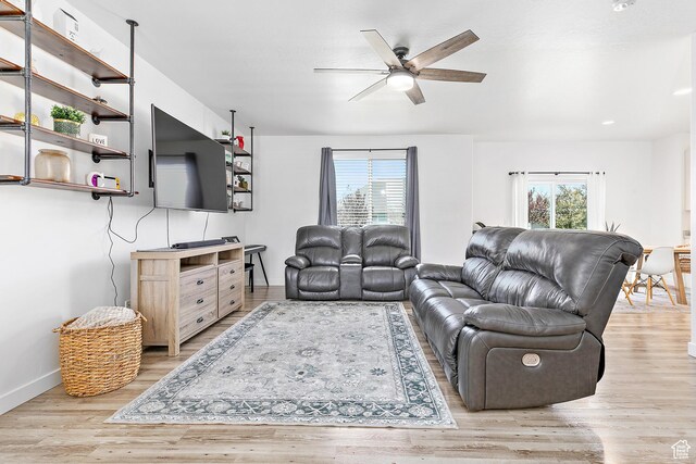 4857 N Goosefoot Dr, Eagle Mountain, UT 84005 - living area featuring healthy amount of natural light, a ceiling fan, wood finished floors, and recessed lighting