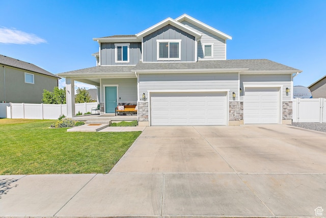 4857 N Goosefoot Dr, Eagle Mountain, UT 84005 - view of front facade with board and batten siding, concrete driveway, stone siding, and an attached garage
