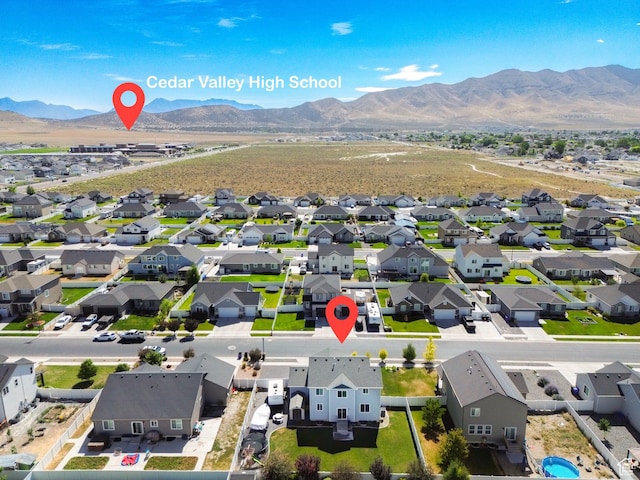 4857 N Goosefoot Dr, Eagle Mountain, UT 84005 - aerial view of residential area with a mountainous background