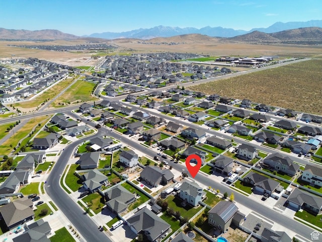 4857 N Goosefoot Dr, Eagle Mountain, UT 84005 - aerial view of property and surrounding area with a mountain backdrop and nearby suburban area