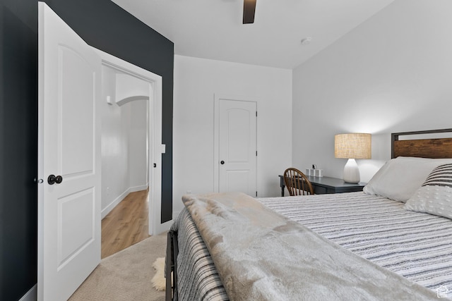 4323 W 2650th Cir S, Hurricane, UT 84737 - bedroom with ceiling fan, light carpet, a closet, and light wood finished floors