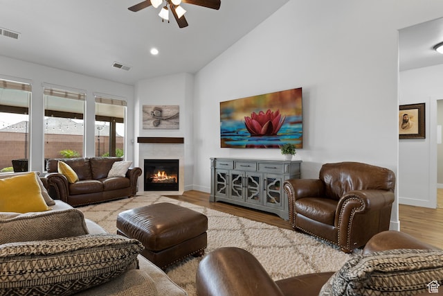 4323 W 2650th Cir S, Hurricane, UT 84737 - living room with ceiling fan, wood finished floors, lofted ceiling, a tiled fireplace, and recessed lighting