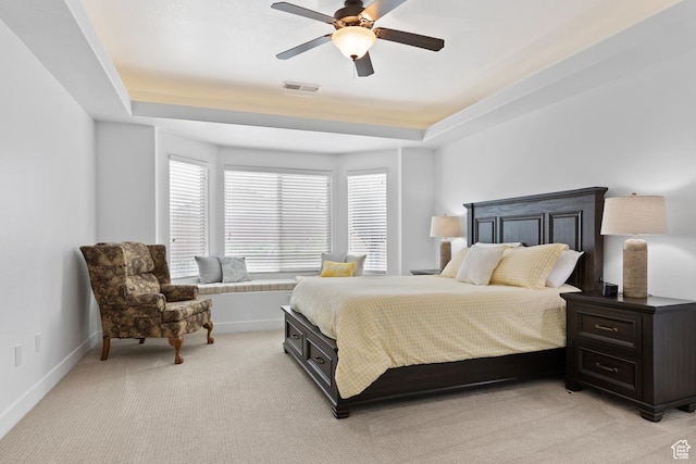 4323 W 2650th Cir S, Hurricane, UT 84737 - bedroom featuring a raised ceiling, light carpet, and a ceiling fan