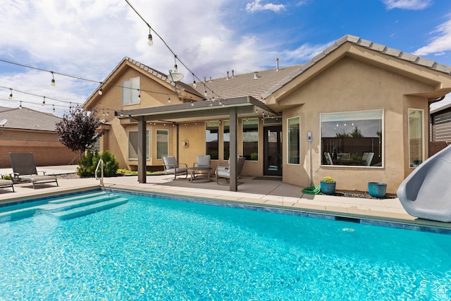 4323 W 2650th Cir S, Hurricane, UT 84737 - rear view of property with a patio area, stucco siding, and an outdoor pool