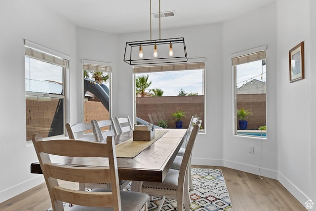 4323 W 2650th Cir S, Hurricane, UT 84737 - dining room featuring plenty of natural light and light wood-type flooring