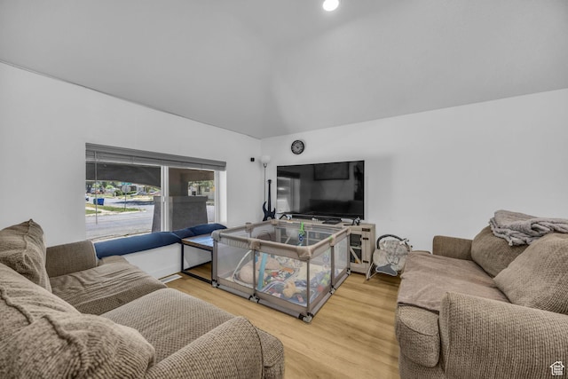 450 E 32 S, Ogden, UT 84401 - living room featuring vaulted ceiling and wood finished floors