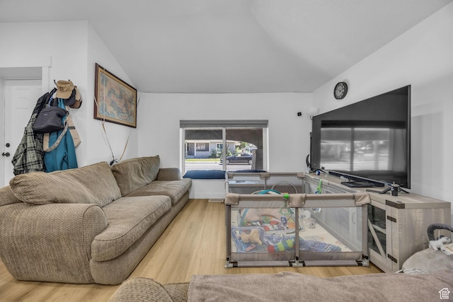 450 E 32 S, Ogden, UT 84401 - living area featuring wood finished floors and vaulted ceiling