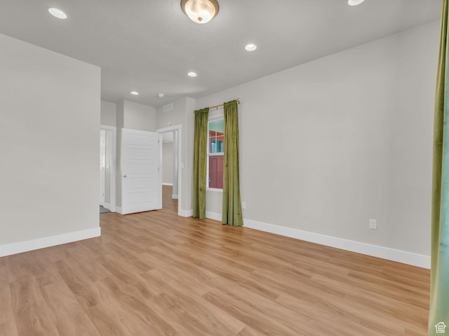 5103 W Black Twig Dr, South Jordan, UT 84009 - spare room with light wood finished floors and recessed lighting