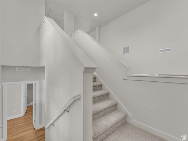 5103 W Black Twig Dr, South Jordan, UT 84009 - stairs featuring recessed lighting and wood finished floors