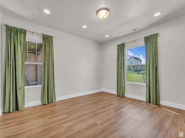 5103 W Black Twig Dr, South Jordan, UT 84009 - spare room with light wood-style flooring and recessed lighting