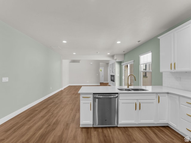 5103 W Black Twig Dr, South Jordan, UT 84009 - kitchen featuring dishwasher, wood finished floors, light countertops, recessed lighting, and open floor plan