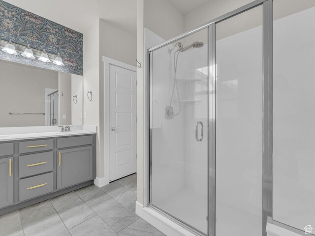 5103 W Black Twig Dr, South Jordan, UT 84009 - bathroom with a shower stall, vanity, and tile patterned floors