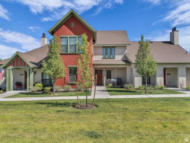 5103 W Black Twig Dr, South Jordan, UT 84009 - view of front of home featuring a chimney, stucco siding, a front yard, and a shingled roof