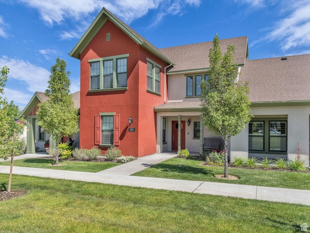 5103 W Black Twig Dr, South Jordan, UT 84009 - view of front of house with stucco siding, a front lawn, and roof with shingles