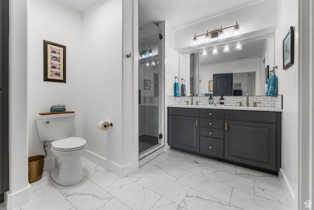 12403 Ross Creek Dr, Kamas, UT 84036 - bathroom with marble look tiles, double vanity, a stall shower, and tasteful backsplash