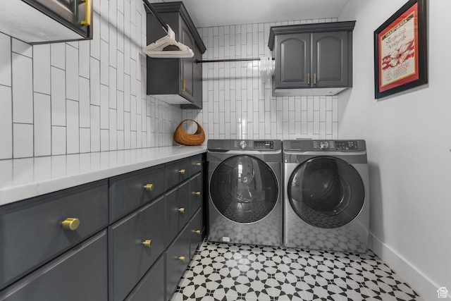 12403 Ross Creek Dr, Kamas, UT 84036 - laundry area with cabinet space, washer and dryer, and tile patterned floors