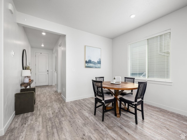 1911 N Lemongrass Dr, Saratoga Springs, UT 84045 - dining room with light wood-style floors and recessed lighting