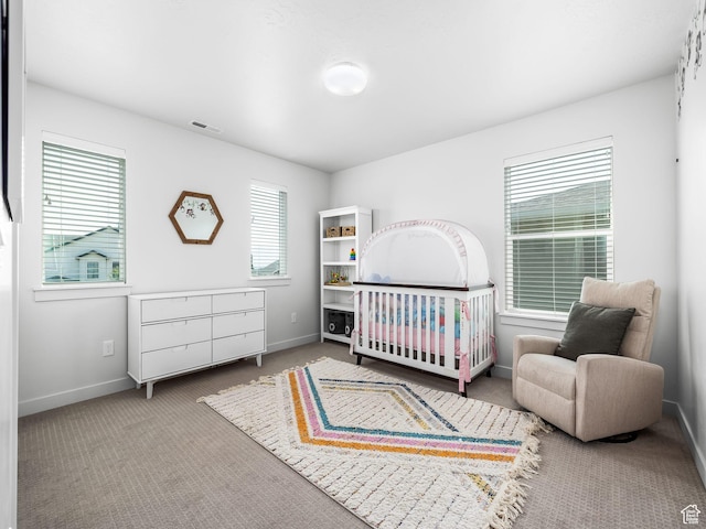 1911 N Lemongrass Dr, Saratoga Springs, UT 84045 - carpeted bedroom featuring baseboards and a crib