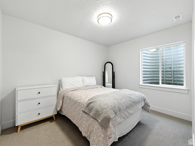 1911 N Lemongrass Dr, Saratoga Springs, UT 84045 - bedroom with light colored carpet and a textured ceiling