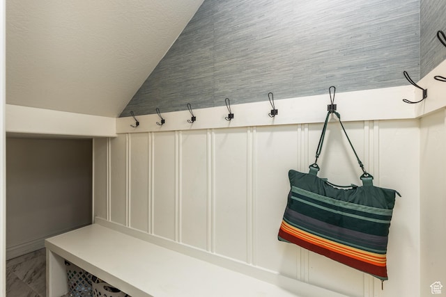 1012 N Cambria Dr, North Salt Lake, UT 84054 - mudroom featuring lofted ceiling and marble finish flooring
