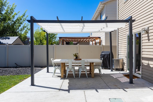 1012 N Cambria Dr, North Salt Lake, UT 84054 - fenced backyard with outdoor dining space, a pergola, a patio area, and a grill